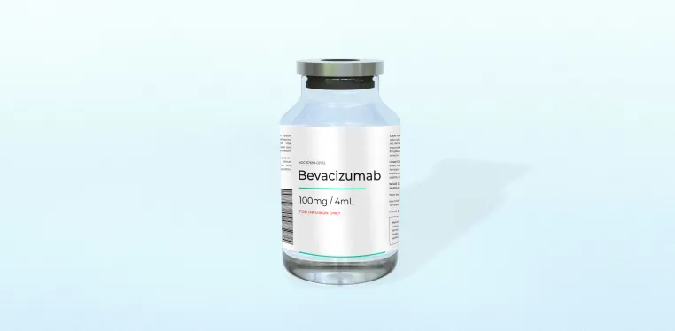 A closeup of a medicine bottle that reads "Bevacizumab 100mg / 4ml"