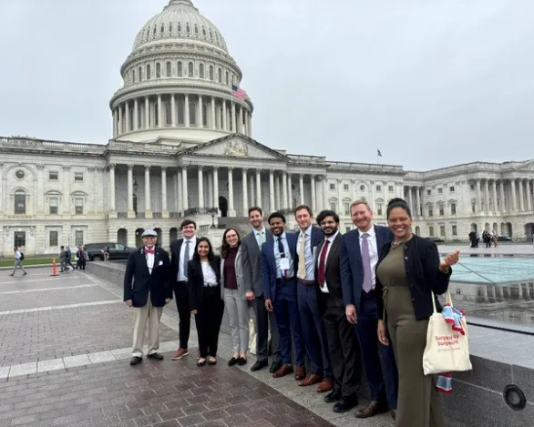 A group of ophthalmologists in front of the U.S. capitiol building