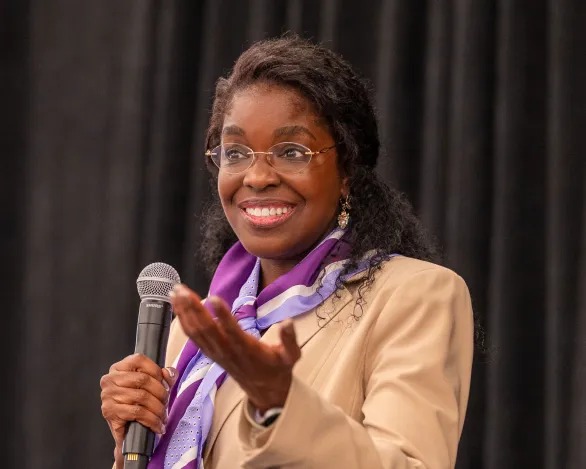 Ophthalmologist advocate speaking to a crowd