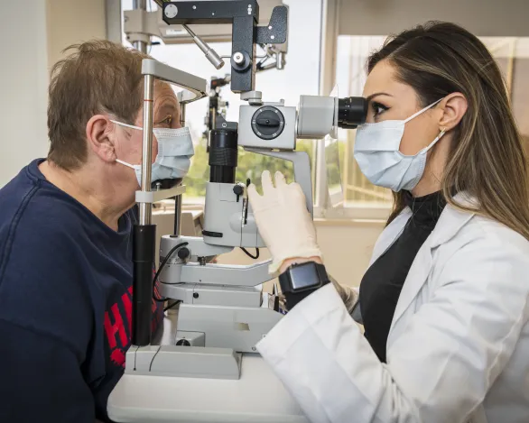 Ophthalmologist examining a patient
