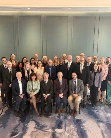 A large group photo of Academy leadership