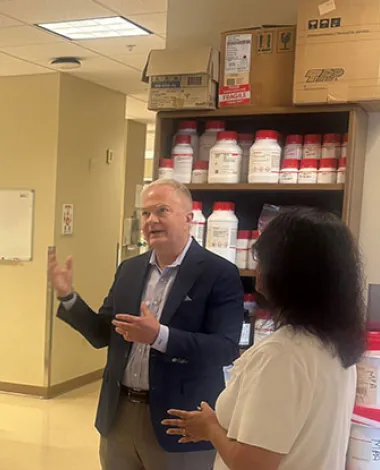 Ophthalmologist R. Michael Siatkowski speaks with Senate Staff in the Dean McGee Eye Institute 