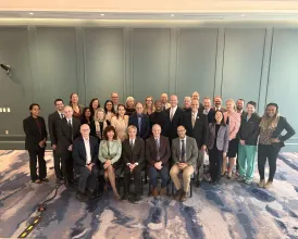 A large group photo of Academy leadership