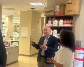 Ophthalmologist R. Michael Siatkowski speaks with Senate Staff in the Dean McGee Eye Institute 