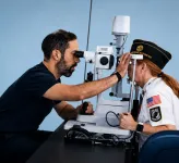 A U.S. veteran receives an eye exam at an American Legion event.